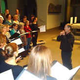 Wolfgang Helbich dirigiert das AV in der Stiftskirche Stuttgart